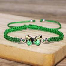 1 pieza Pulsera ajustable tejida a mano con estilo bohemio, con elementos de mariposa y nudos planos. Esta pulsera presenta un estilo bohemio, hecha a mano con elementos de mariposa y nudos planos, y viene con un diseño ajustable. Es adecuada para el uso diario en todas las estaciones, tiene colores ricos y es un artículo de moda imprescindible para tomar fotos durante las salidas.