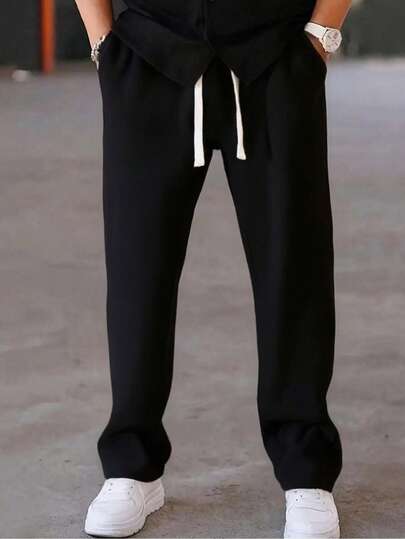 男士基本款宽松时尚户外长裤，休闲简约纯色，轻质透气梭织，抽绳腰部，大口袋，适合日常散步、工作、旅行等。