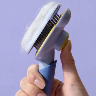 宠物梳 猫毛脱毛 钢针梳 宠物刷 开合式脱毛刷 猫狗适用。一梳一推，轻松脱毛。科学设计，不伤皮肤。材质。小熊造型，时尚可爱。