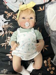 An 18-Inch (45 Cm) Adorable Lifelike Newborn Doll Made Of Vinyl Silicone, With Golden Hair And A Cute Face, Suitable As A Birthday Gift, Christmas Gift, Or Halloween Gift.