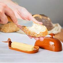 Ursword 1 zestaw pięknej ceramicznej maselniczki z pokrywką do lodówki blatowej, pojemnik na masło w kształcie wieloryba z porcelanową pokrywką i uchwytem do masła w kostce East West Coast, pojemnik na masło, zabawny wystrój kuchni i akcesoria na prezenty kuchenne, kolorowy, zawiera kolor biały, zielony, pomarańczowy, żółty i czarny