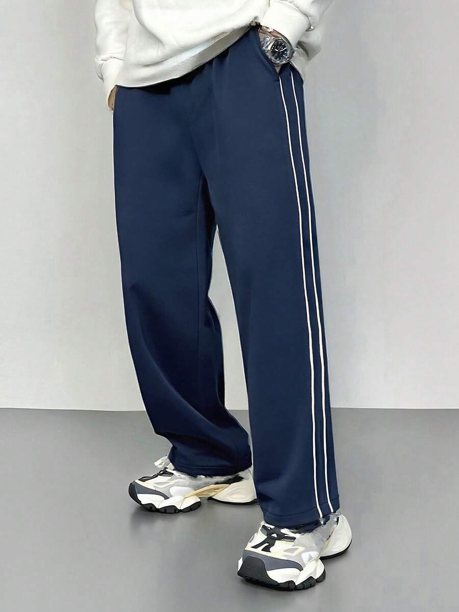 بنطلون رياضي مخطط فضفاض عادي للرجال، خريف