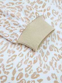 Acelitt Spring And Autumn Women's Khaki Leopard Print Splicing Ribbed Edge Ruffle Detail Round Neck Knitted Top