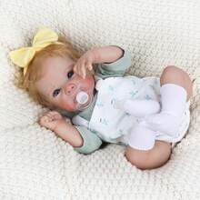 An 18-Inch (45 Cm) Adorable Lifelike Newborn Doll Made Of Vinyl Silicone, With Golden Hair And A Cute Face, Suitable As A Birthday Gift, Christmas Gift, Or Halloween Gift.