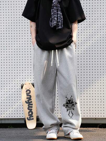 Pantalon décontracté ample à jambes droites en tricot pour hommes, pantalon de survêtement ample avec imprimé lettres et crâne, convient pour le printemps/automne, les sorties décontractées, les rendez-vous, les activités de plein air, le style de rue