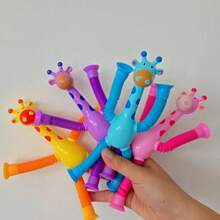Decoración navideña: Set de 4 juguetes de jirafa que brillan en la oscuridad con ventosa telescópica de colores aleatorios, juguetes anti-estrés para adolescentes y adultos, regalos de cumpleaños/festividades, juguetes divertidos - multicolor - Ver 10