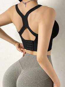 Sujetador deportivo para mujer con push up sexy, diseño de espalda cruzada, parte superior de yoga, sujetador inalámbrico, resistente al sudor y cómodo, lencería para gimnasio - Negro - Ver 5