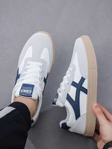 男士休闲滑板鞋，适合日常通勤、户外运动，经典运动鞋