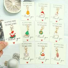 10件套女士圣诞节日钥匙扣套装 - 驯鹿、雪花、姜饼人、圣诞老人等，附赠感谢卡 - 坚固耐用的锌合金材质 - 送给老师、妈妈、女朋友、闺蜜的贴心礼物 - 生日、圣诞节、感恩节、教师节、婚礼、毕业典礼等场合皆宜，可作包包挂饰或汽车挂件，也可作为姐妹礼物。 - 彩色 - 查看 1