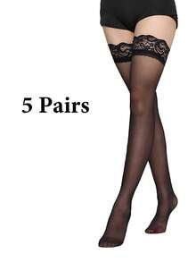 两双黑白渔网袜，适合女性日常及假日穿着，适合体重88-132磅的女性。 - 黑與白 - 查看 17