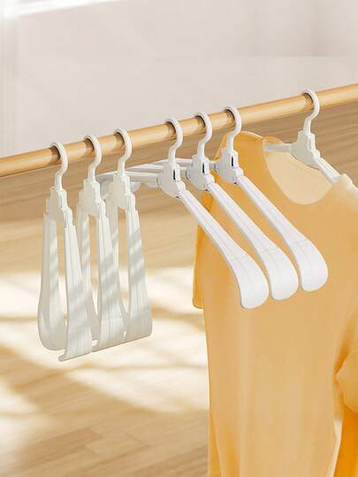 1pc Portable Wide Shoulder Thickened Clothes Hanger - Non-Slip Durable Plastic Garment Hanger, Space-Saving Folding Storage Rack For Home & Travel, No Assembly Required, Lightweight & Sturdy (Suitable For Shirts, Dresses, Coats), Can Be Installed In Wardrobe System