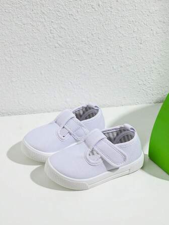 1 st små pojkar och flickor enfärgade moderiktiga runda huvuden andningsbara vardagsskor för fyra säsonger