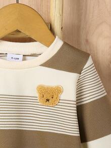 Set de 2 piezas de top de manga larga con bordado de oso a rayas y pantalones casuales con cordón para niños pequeños, adecuado para otoño/invierno