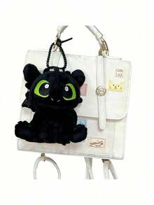 Universal Pictures 13厘米梦工厂《驯龙高手》无牙仔毛绒钥匙扣 | 可拆卸背包挂钩 | 柔软毛绒玩偶，儿童礼物 | 官方授权坐姿毛绒玩偶 - How to Train Your Dragon - 查看 10