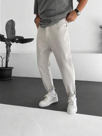 男士休闲百搭纯色锥形牛仔裤