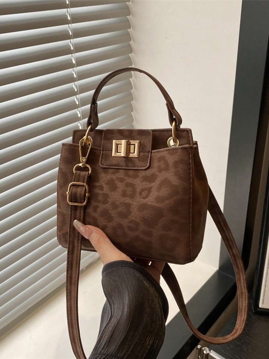 新款时尚休闲可锁手提包，适合聚会、郊游、购物和日常使用，可存放硬币、手机，也适合作为白领、大学生和办公室职员的工作包，优雅的女士包