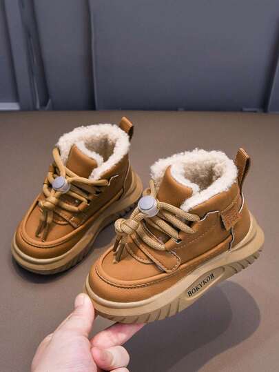 1 双男女时尚厚底纯色雪地靴，软底防滑婴儿靴，韩版保暖内衬儿童户外靴，适合秋冬季