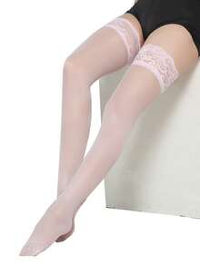 两双黑白渔网袜，适合女性日常及假日穿着，适合体重88-132磅的女性。 - 黑與白 - 查看 10