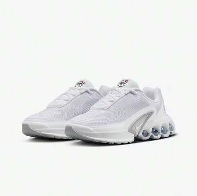Nike 耐克女子低帮跑鞋，采用气垫中底设计，轻盈舒适，耐穿，适合训练、通勤和户外活动。Air Max Dn 未来主义设计，百搭日常休闲穿着。货号：FB8987-100
