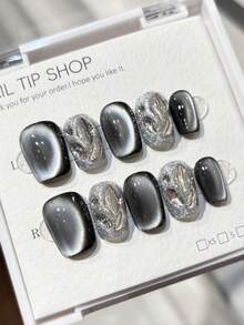 10片美甲贴纸，DIY超大猫眼星空图案，黑色可拆卸可重复使用指甲贴，适用于舞台、舞蹈、舞会、派对等场景。内含1盒指甲胶和1个指甲抛光器。按压式美甲用品