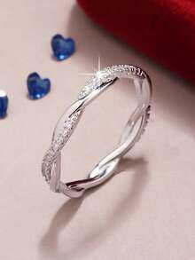 1 قطعة خاتم أنيق مرصع بالزركونيا المكعبة اللامعة، بتصميم ملتف متقاطع، مناسب للرجال والنساء، مثالي للارتداء اليومي والمناسبات الخاصة، هدية رائعة لعيد الحب، عيد الميلاد، عيد الأم، عيد الأب، عيد الميلاد