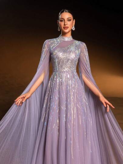 Faeriesty Haute Glamour Gorgeous Sheer Tulle Evening Gown With Cape Sleeves, Intricate Sparkly Beaded & Sequin Linear Geometric Patterns, Fitted Waist & A-Line Skirt | Glamorous Formal Design | Perfect For Red-Carpet Events, Wedding Guest Attire, Proms, And Upscale Evening Parties For Women​
