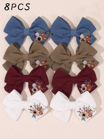 8个花朵刺绣蝴蝶结发夹，纯色，柔软面料，精致刺绣蝴蝶结发夹，鸭嘴夹款式，适合青少年日常佩戴