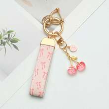 1pc Elegant Printed PU Leather Keychain With Rust-Resistant Zinc Alloy Ring, Decorated With Stylish Letter Charm - Fashionable Women's Accessory For Car Keys, House Keys, And Gift-Giving, Durable Keychain