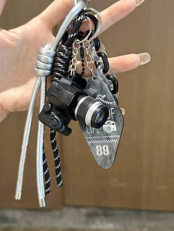 Schwarze Mini-Blitzlicht-Kamera Geflochtene Schnur Taschenbaumler, Unisex Schlüsselanhänger mit abnehmbarem Design - eine perfekte Wahl für Fotografie-Enthusiasten, ein ideales Unisex-Geschenk, geeignet zum Dekorieren von Rucksäcken, Umhängetaschen und Schlüsseln