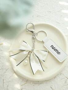 1 Set Of Personalized Bow Keychain, Custom Name Leather Key Ring, With Pearl Tassel Bow Bag Pendant, Diamond-Mixed Key Ring, Custom Key Accessory, Christmas Gift, For Friends And Family. It Is Cute, Charming, Colorful, Y2K-Style, Fashionable, Unisex, Casual, Customizable, Personalized, Unique, And A Custom Version.