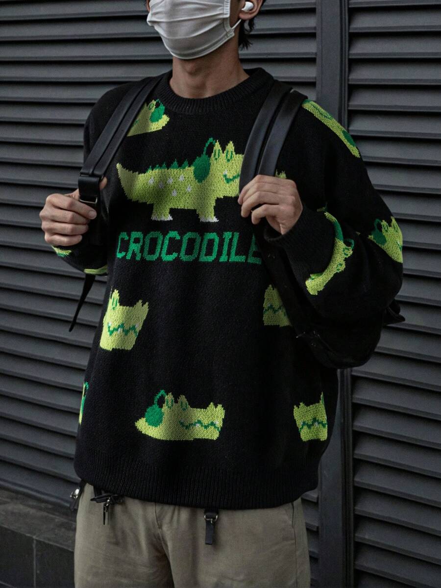 Suéter masculino casual folgado de cor sólida com estampa fofa de crocodilo e letras, ideal para outono e inverno.