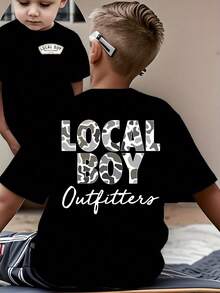 Men's Children's Black T-Shirt With Camouflage Dog Small Print On The Front Chest, And Local Boy Letter Camouflage Dog Moon Pattern Print On The Back. A Casual Boys' Short-Sleeved Shirt Suitable For Daily School Wear, Boys' T-Shirt. - 黑色1 - 查看 1