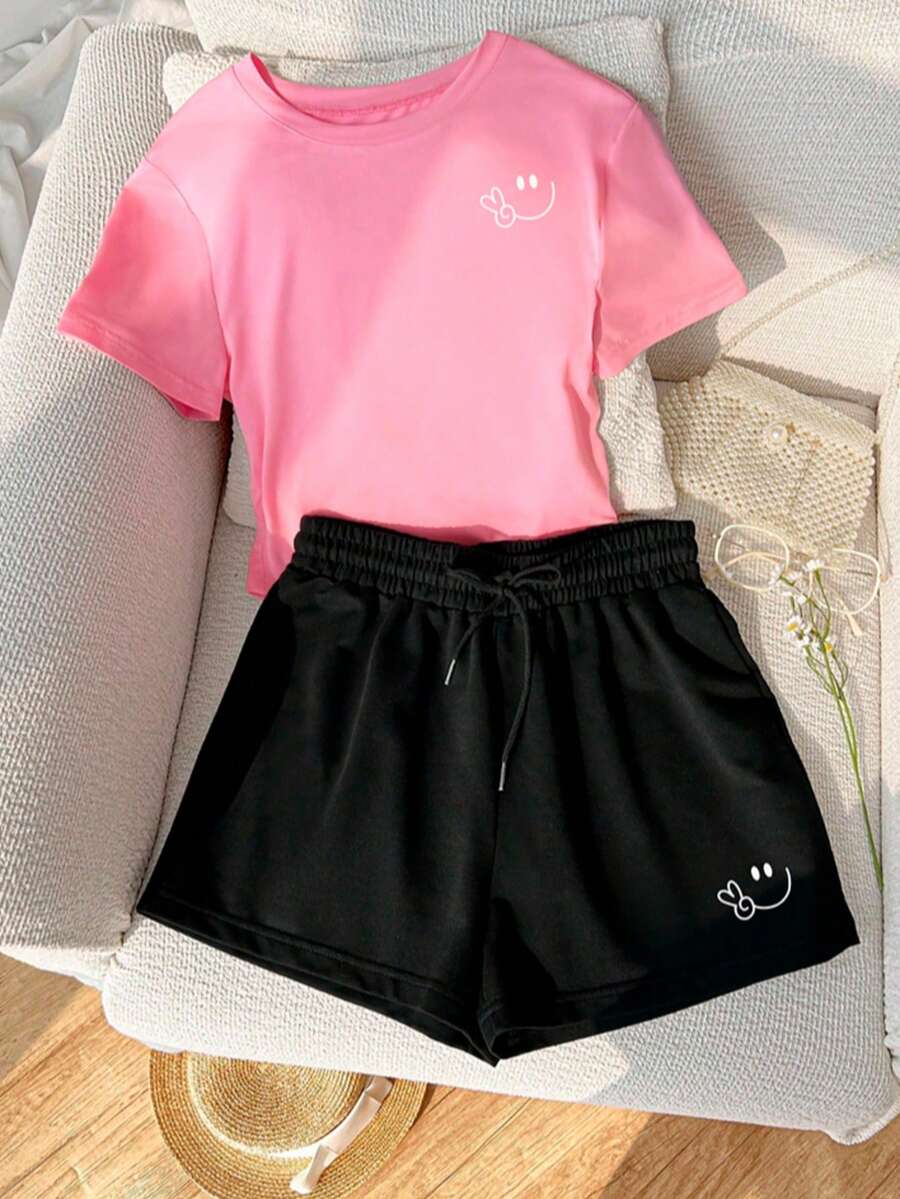 Conjunto urbano Outfit casual Estilo streetwear Look cómodo y moderno Ropa con estilo Conjunto con actitud Moda relajada Conjunto colorido Outfit con personalidad Estilo fresco y atrevido geometrico carita - Rosa - Ver 1