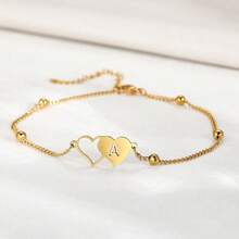 1 pieza Tobillera de acero inoxidable con cadena de cuentas de color dorado con diseño clásico y sencillo de doble corazón hueco para mujeres