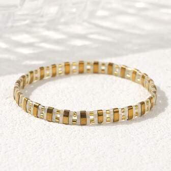 1条优雅波西米亚风TILA串珠手链，金色TILA串珠手链，金粉色TILA串珠手链，弹性沙滩TILA手链，防水、防汗、防褪色，适合日常通勤、派对搭配，可作为送给家人/朋友/沙滩的礼物