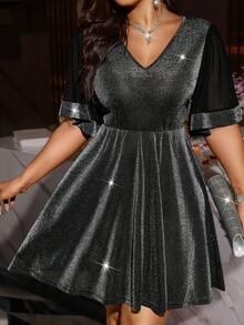 Vestido elegante plus size com decote em V e cintura marcada