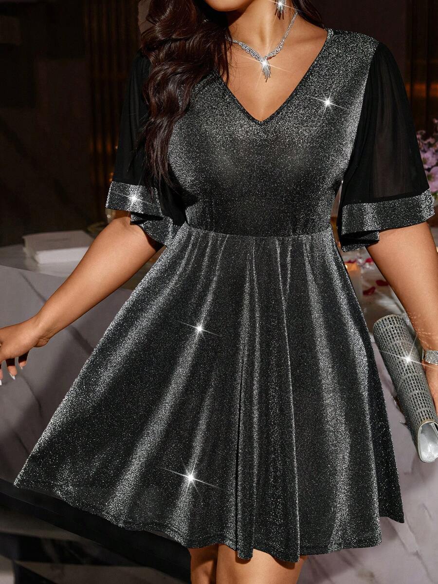 Vestido elegante plus size com decote em V e cintura marcada