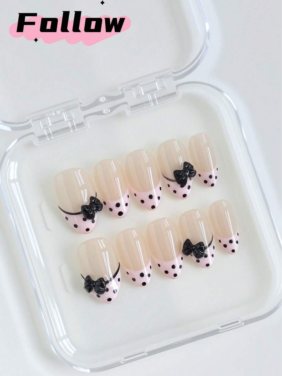 10 móng tay giả thủ công hình hạnh nhân, kiểu ngắn, chấm bi hồng đen, kiểu móng Pháp, trang trí nơ 3D dễ thương, phù hợp cho phụ nữ và bé gái khi đi nghỉ mát hoặc sử dụng hàng ngày.