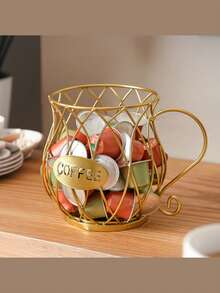 Un porte-capsules de café doré, panier de rangement pour capsules de café, étagère de rangement de collations et bonbons de luxe léger, panier de rangement pour capsules de café convenant aux comptoirs de bar, en métal, convenant aux cafés et hôtels domestiques, noir