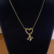 1 Piece Of Fashionable And Simple Stainless Steel Hollowed-Out Heart A-Z,26 English Letter Pendant Titanium Steel Necklace, Female Surname Collarbone Chain, A Niche And Light Luxury Gift For Best Friends, Family And Loved Ones On Festivals! Suitable For Daily Casual Wear Of Necklace Jewelry