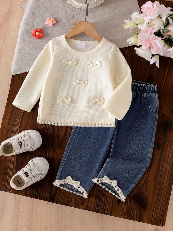 2pcs Baby Girl Fashion Minimalist Boho Style Long Sleeve T-Shirt With 3D Bow & Tassel Trim And Elastic Waist Jeans Pants Set