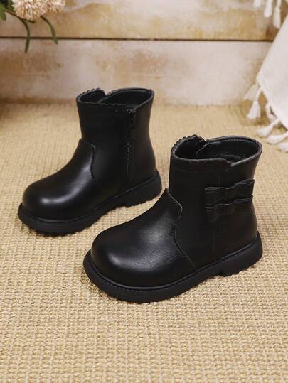 1 双女童蝴蝶结蕾丝侧拉链防滑舒适圆头简约时尚平底踝靴，适合秋冬季