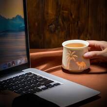 1 pieza Taza de espresso de cerámica, taza de té, diseño hueco creativo, estilo del desierto de Oriente Medio, árbol de coco de camello, la belleza del arte del vasto desierto, taza simple y exquisita de alta gama, resistente a altas temperaturas, sensación cómoda, alta calidad, taza de té para oficina y hogar, muy adecuada para uso personal o regalo