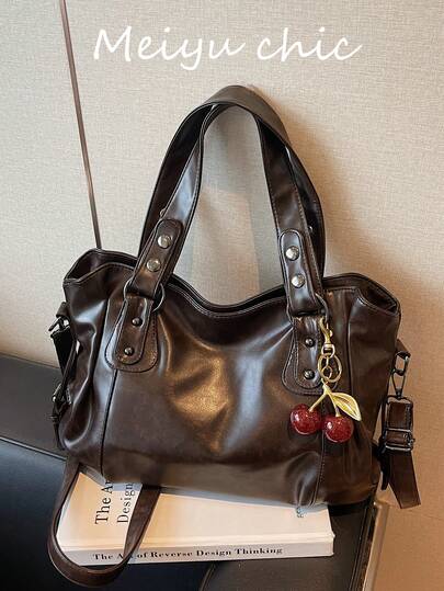 This Classic And Stylish New Multi-Functional Solid Color Shoulder Bag Is Designed With Large Capacity And Retro PU Fabric, Featuring A Cherry Pendant Decoration For The Handbag And A Zipper Design For Women's Commuting Bags. It Is Perfect For Various Occasions Such As Shopping, Traveling, And Commuting To Work