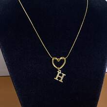 1 Piece Of Fashionable And Simple Stainless Steel Hollowed-Out Heart A-Z,26 English Letter Pendant Titanium Steel Necklace, Female Surname Collarbone Chain, A Niche And Light Luxury Gift For Best Friends, Family And Loved Ones On Festivals! Suitable For Daily Casual Wear Of Necklace Jewelry