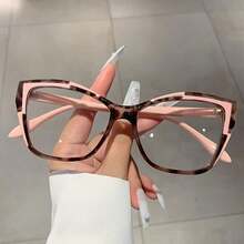 Un par de gafas sin receta con montura de color block y forma de ojo de gato para mujer - caparazón de tortuga azul - Ver 1