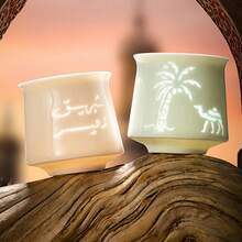 1 pieza Taza de espresso de cerámica, taza de té, diseño hueco creativo, estilo del desierto de Oriente Medio, árbol de coco de camello, la belleza del arte del vasto desierto, taza simple y exquisita de alta gama, resistente a altas temperaturas, sensación cómoda, alta calidad, taza de té para oficina y hogar, muy adecuada para uso personal o regalo