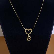 1 Piece Of Fashionable And Simple Stainless Steel Hollowed-Out Heart A-Z,26 English Letter Pendant Titanium Steel Necklace, Female Surname Collarbone Chain, A Niche And Light Luxury Gift For Best Friends, Family And Loved Ones On Festivals! Suitable For Daily Casual Wear Of Necklace Jewelry