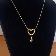 1 Piece Of Fashionable And Simple Stainless Steel Hollowed-Out Heart A-Z,26 English Letter Pendant Titanium Steel Necklace, Female Surname Collarbone Chain, A Niche And Light Luxury Gift For Best Friends, Family And Loved Ones On Festivals! Suitable For Daily Casual Wear Of Necklace Jewelry