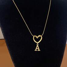 1 Piece Of Fashionable And Simple Stainless Steel Hollowed-Out Heart A-Z,26 English Letter Pendant Titanium Steel Necklace, Female Surname Collarbone Chain, A Niche And Light Luxury Gift For Best Friends, Family And Loved Ones On Festivals! Suitable For Daily Casual Wear Of Necklace Jewelry